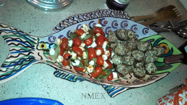 Umm mmm good! Teardrop tomato & mozzerella with basil skewers and stuffed mushrooms